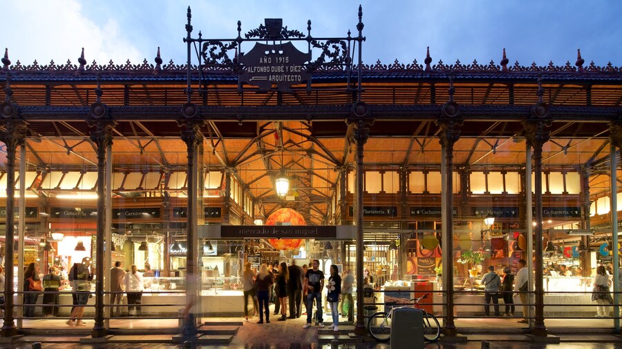 Exterior view of San Miguel Market in Madrid, showcasing its iron-and-glass architecture.