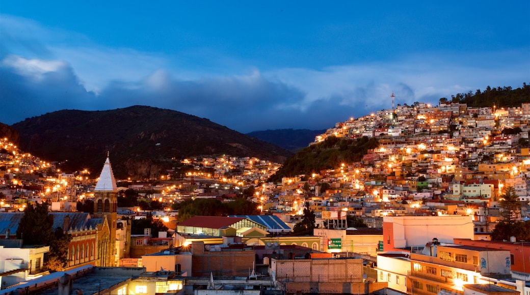 Pachuca which includes a city, landscape views and night scenes