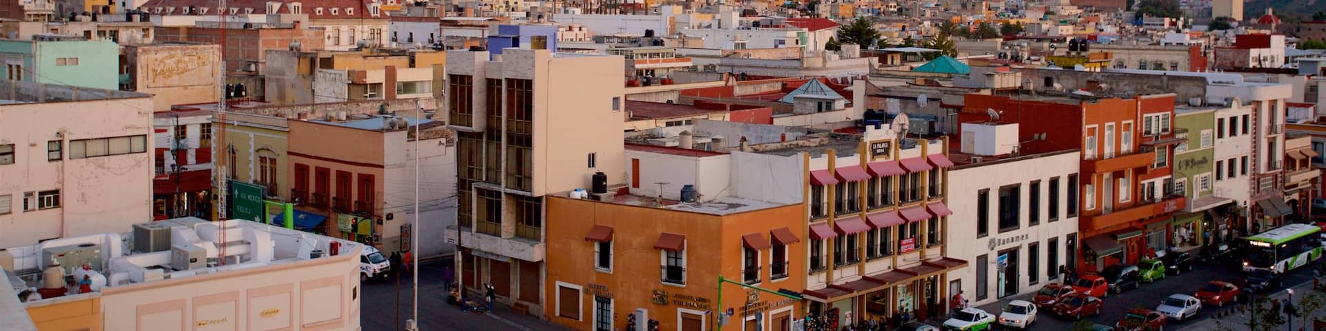 Pachuca which includes a city and a sunset