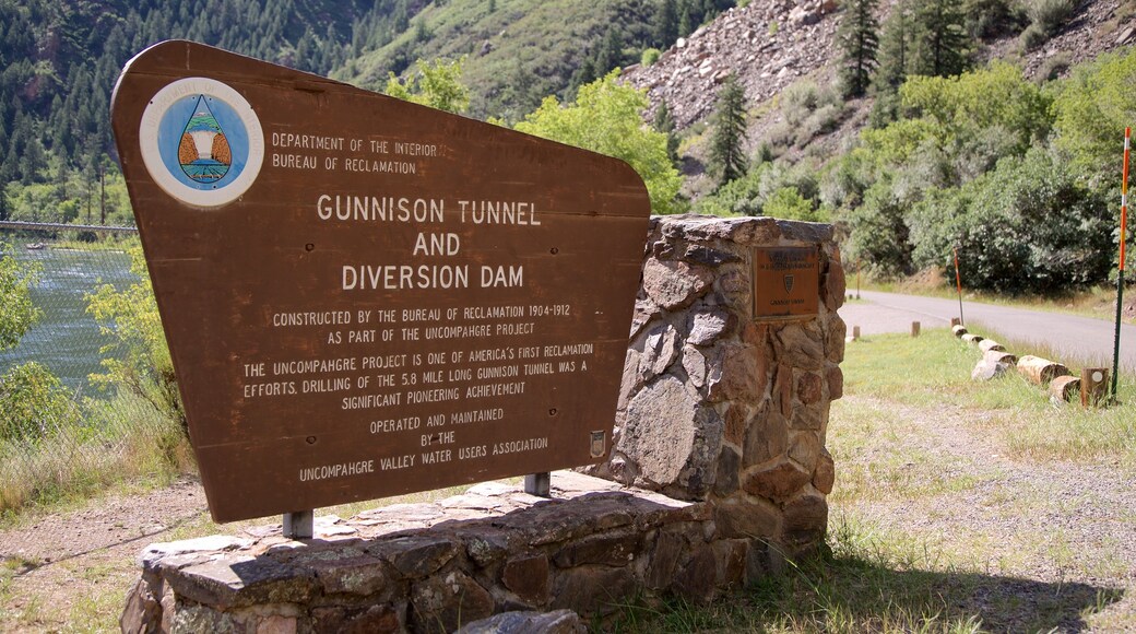 Montrose showing a river or creek and signage