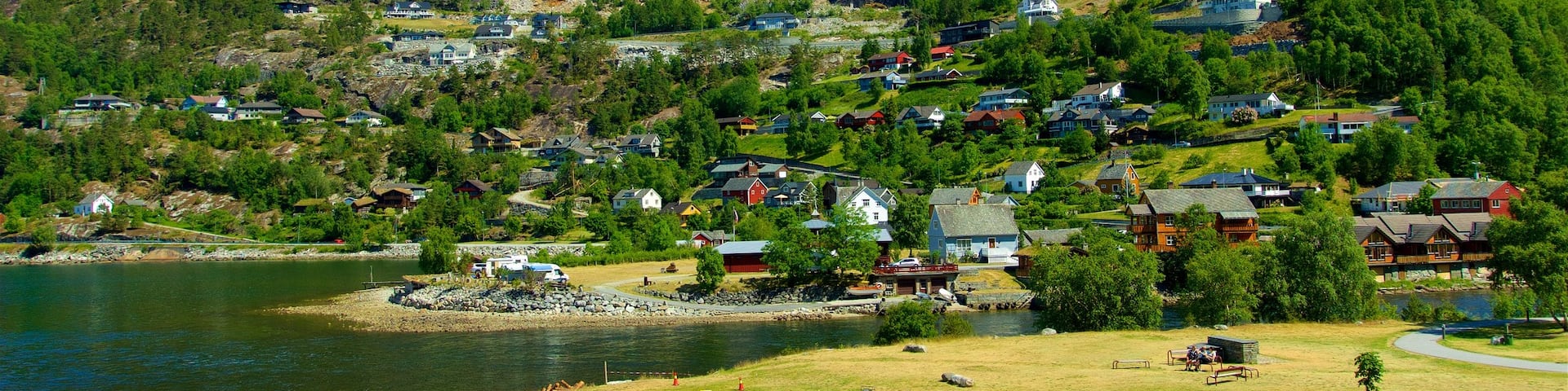 Eidfjord which includes mountains, a lake or waterhole and a small town or village