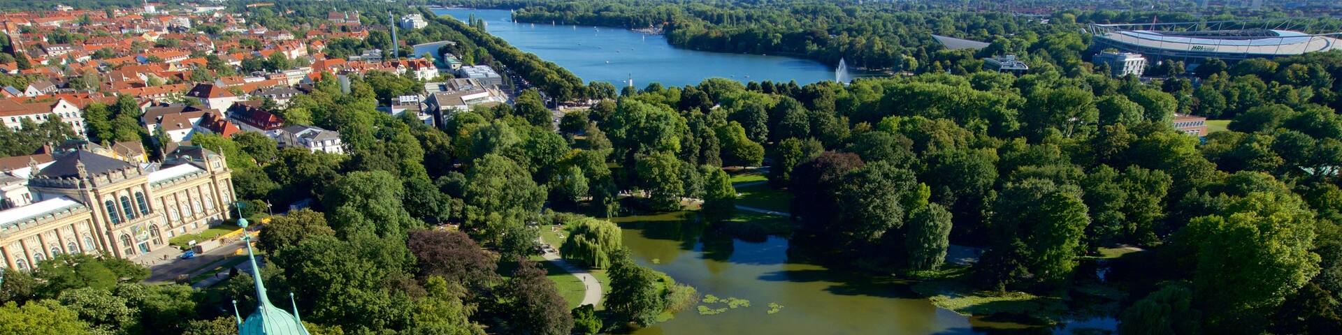 New Town Hall featuring a garden and a lake or waterhole