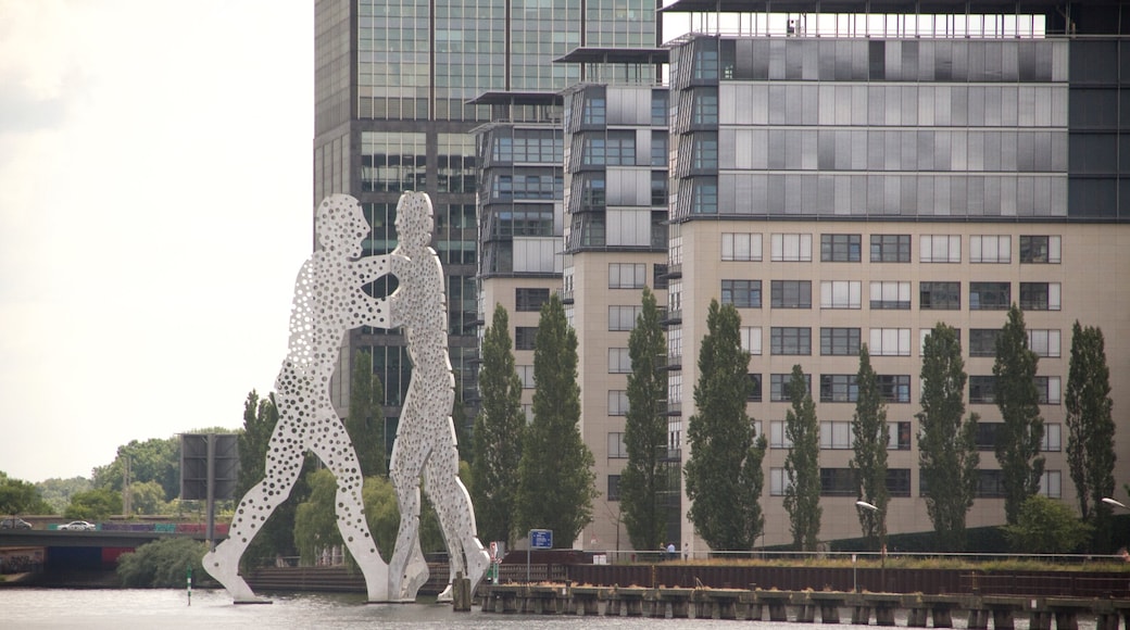 Molecule Man featuring a city and outdoor art