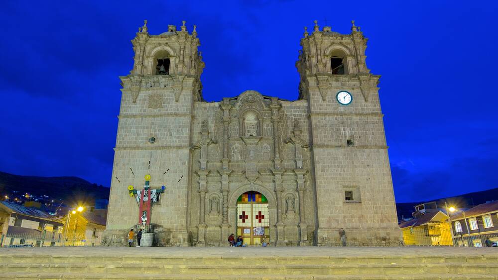 Lake Titicaca which includes night scenes, heritage architecture and a church or cathedral