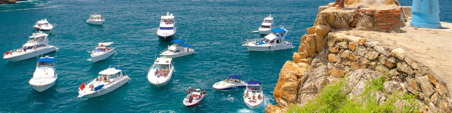La Quebrada Cliffs featuring boating and a bay or harbor as well as an individual male
