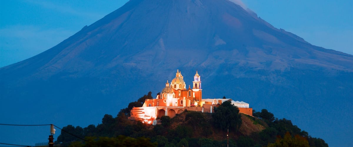 La Virgen de los Remedios Sanctuary showing heritage elements and mountains