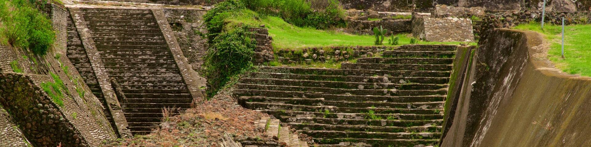 Great Pyramid of Cholula showing heritage elements and a ruin