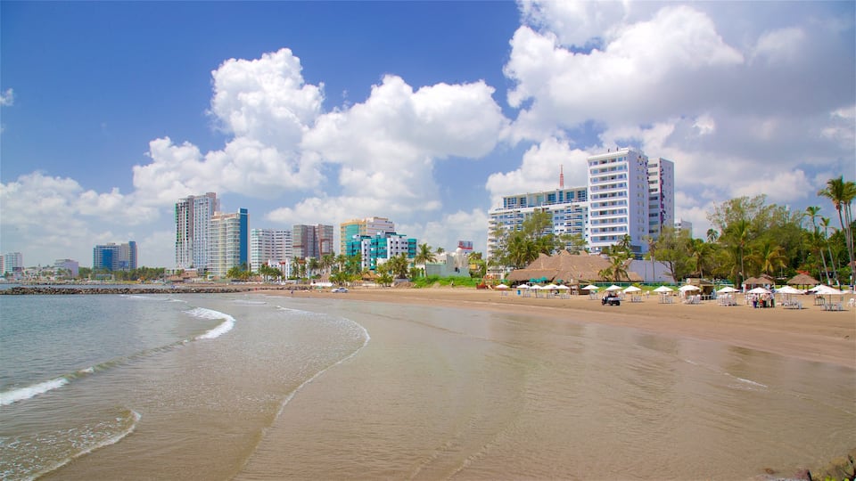 Mocambo Beach which includes a city, a beach and general coastal views