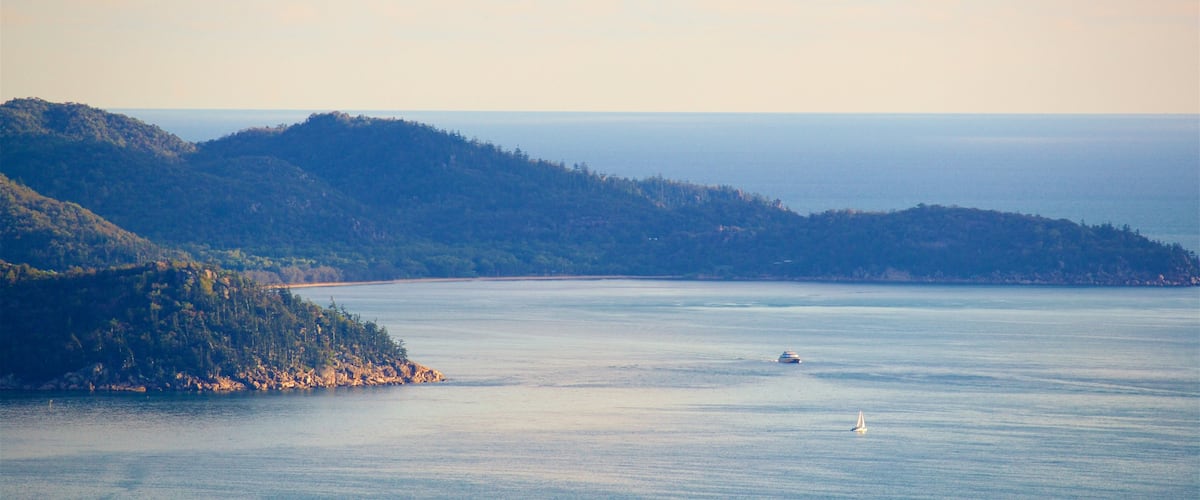 Magnetic Island featuring general coastal views, a sunset and a bay or harbour