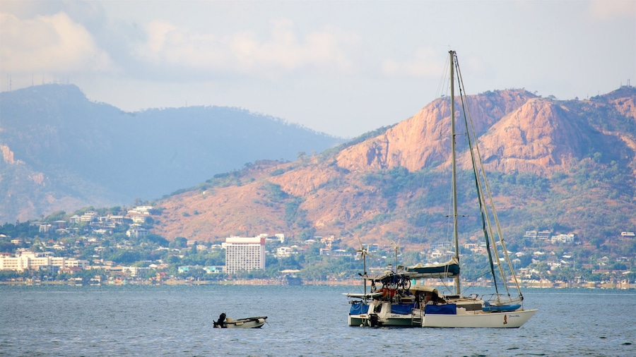 Picnic Bay which includes boating, tranquil scenes and a bay or harbour