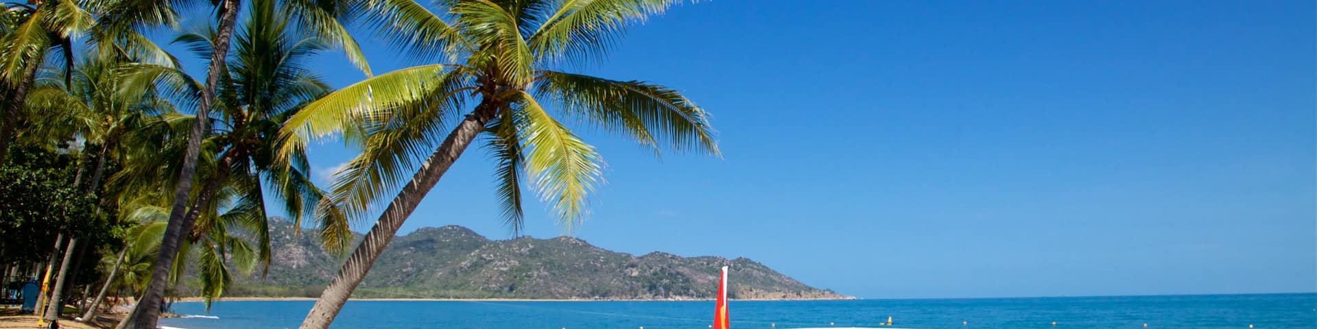 Horseshoe Bay Beach which includes tropical scenes, general coastal views and a beach
