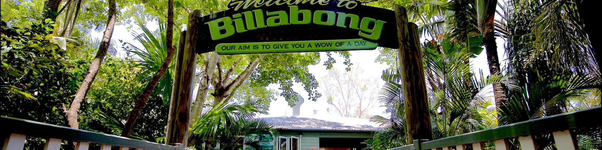 Billabong Sanctuary featuring a bridge and signage