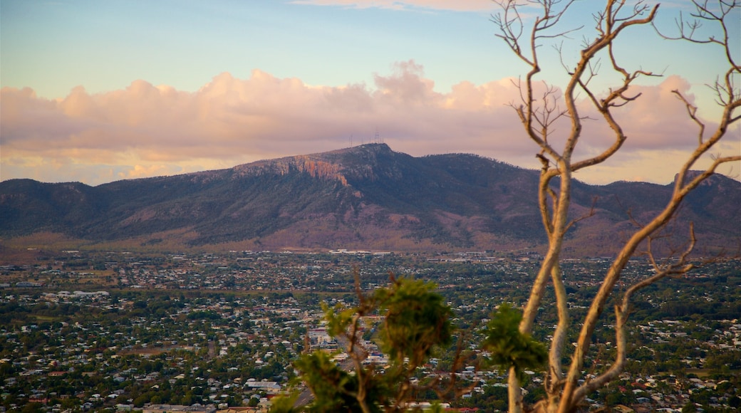 Mount Stuart featuring a small town or village, mountains and a sunset