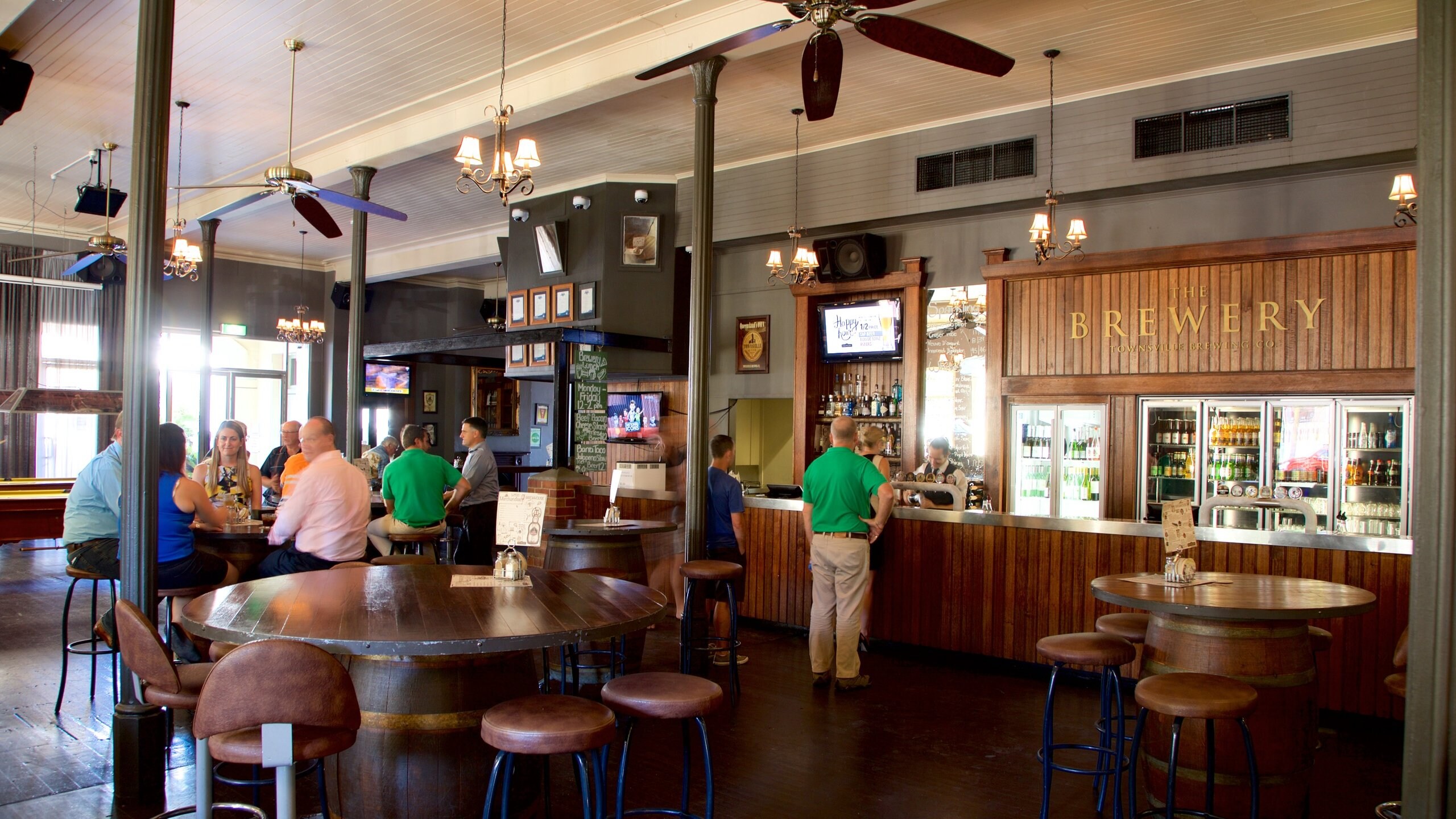 Townsville showing interior views and a bar as well as a small group of people