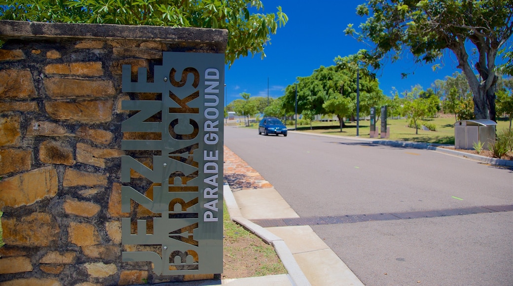 Townsville showing signage and a garden