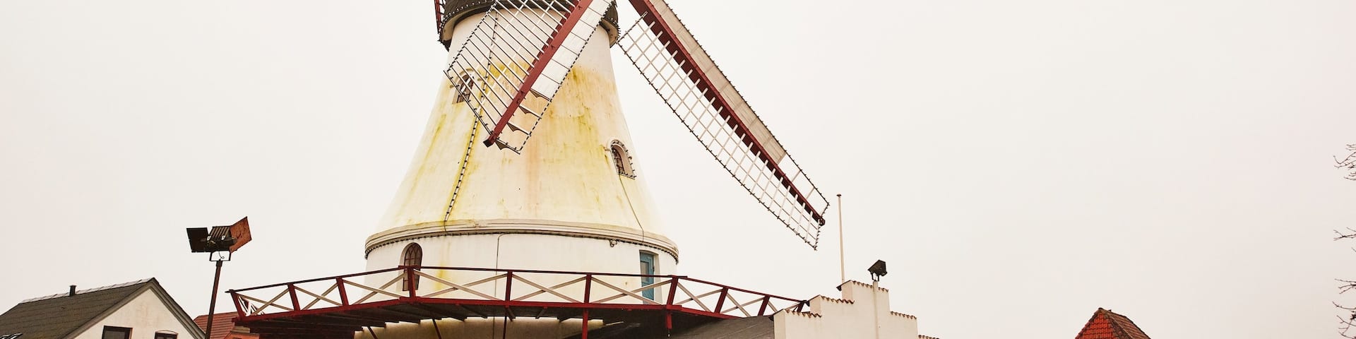 Vejle which includes a lighthouse and mist or fog