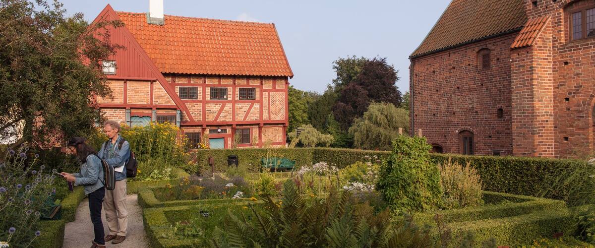 Ystad showing a garden as well as a couple