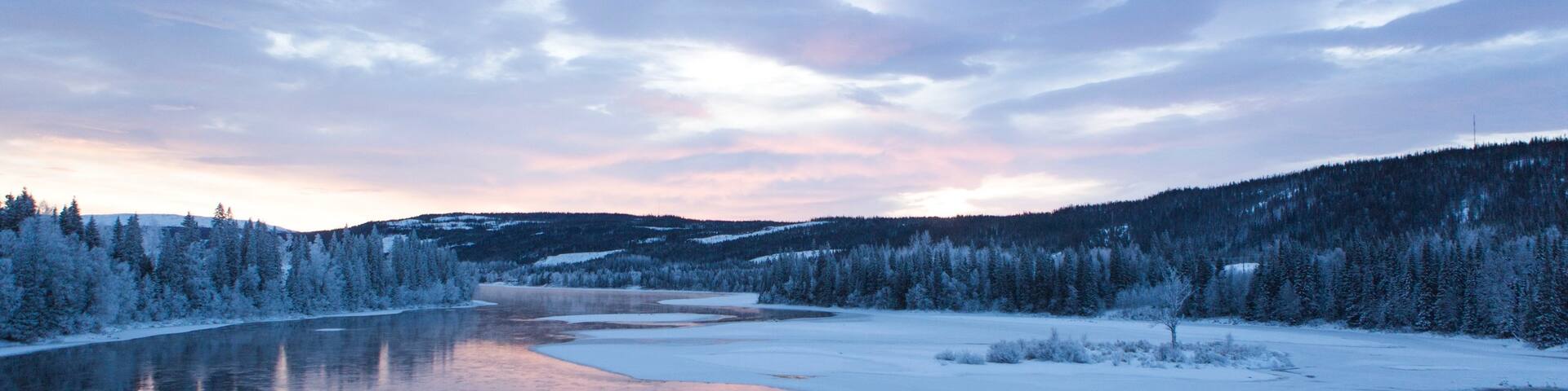Are featuring snow, a river or creek and a sunset