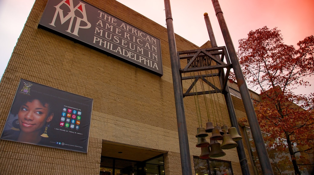 African American Museum featuring signage and a city