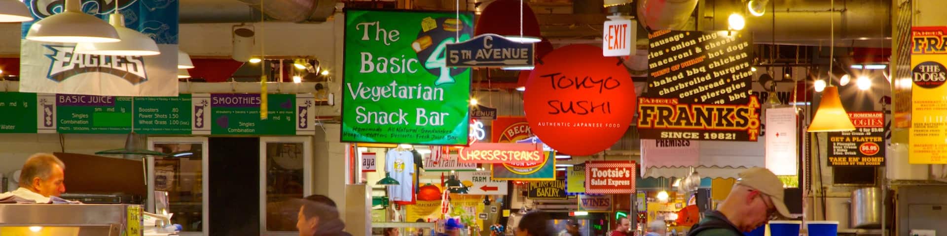 Reading Terminal Market featuring signage, interior views and markets