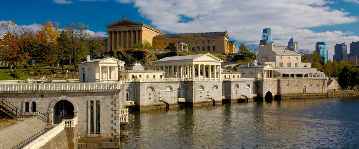 Fairmount Park showing heritage architecture, a lake or waterhole and skyline