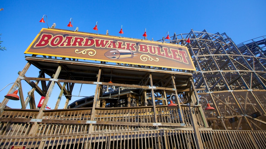 Kemah Boardwalk which includes signage and rides