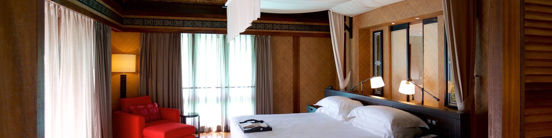 Bora Bora which includes interior views and a luxury hotel or resort