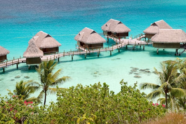 Sofitel Motu which includes tropical scenes and general coastal views
