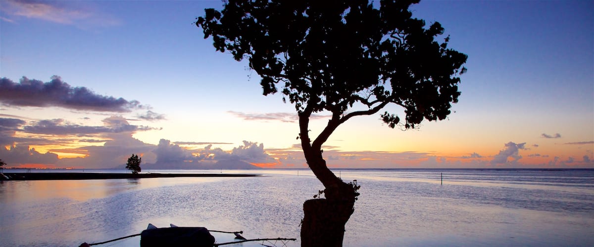 Mahina featuring a sunset and general coastal views