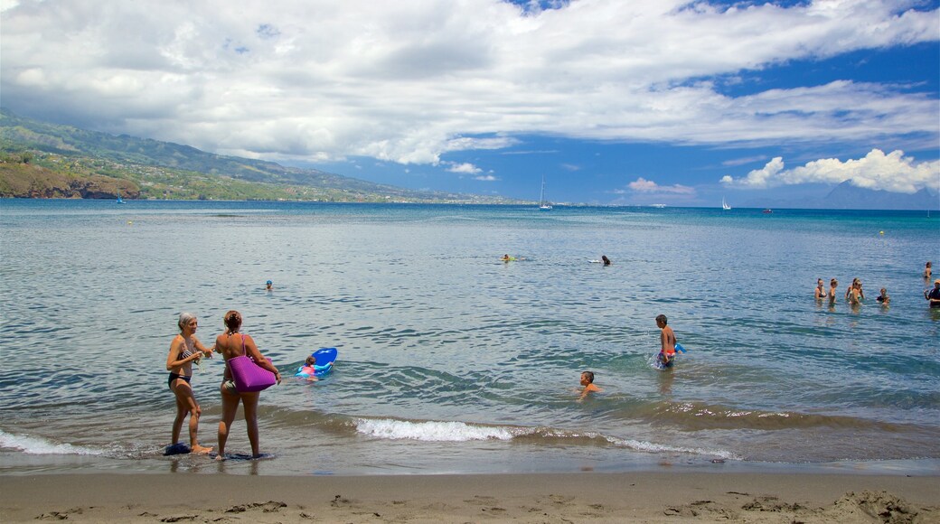 Black Sand Beach which includes general coastal views and swimming as well as a small group of people