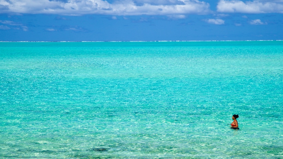 Matira Beach featuring swimming, tropical scenes and general coastal views