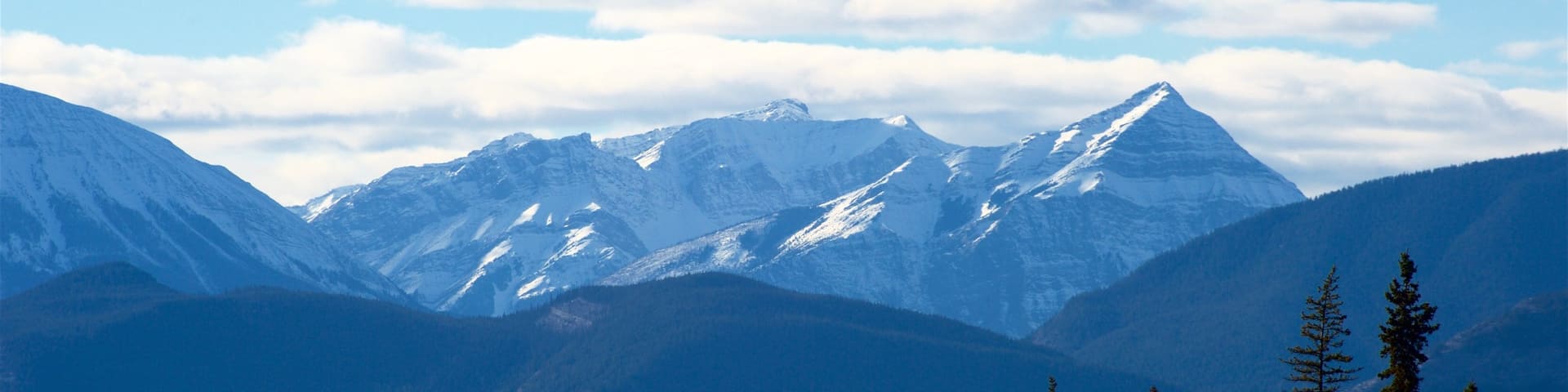 Hinton which includes mountains, tranquil scenes and snow