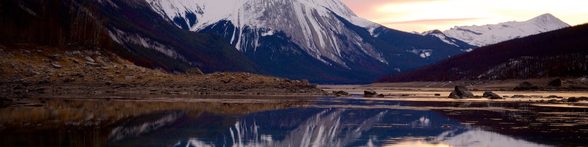 Medicine Lake which includes tranquil scenes, a sunset and a lake or waterhole