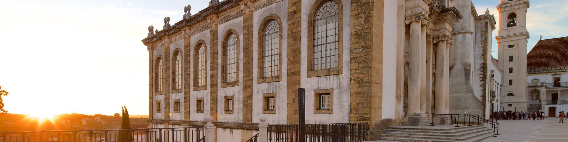 Biblioteca Joanina featuring a sunset