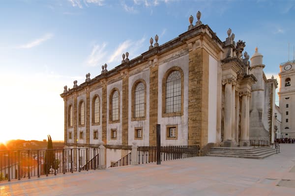 Biblioteca Joanina which includes a sunset