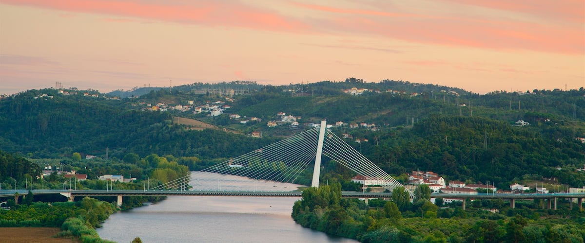 Coimbra featuring a sunset, landscape views and a river or creek