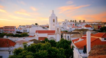 Santo Antonio Church showing a city and a sunset