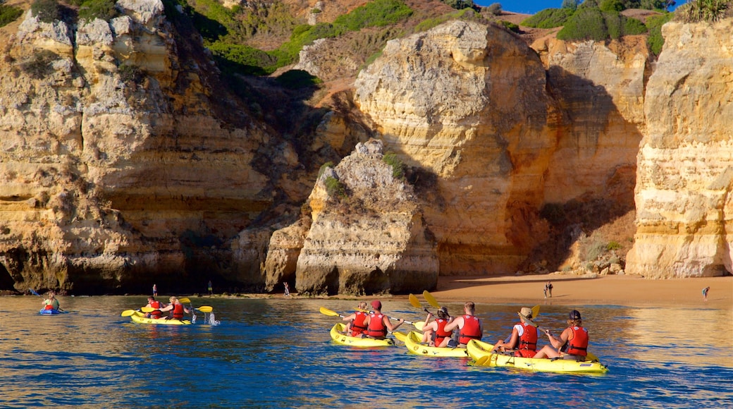 Dona Ana Beach showing rugged coastline, kayaking or canoeing and general coastal views