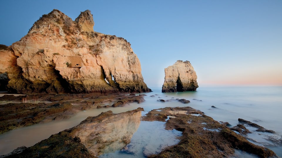 Tres Irmaos Beach featuring a sunset, a beach and general coastal views