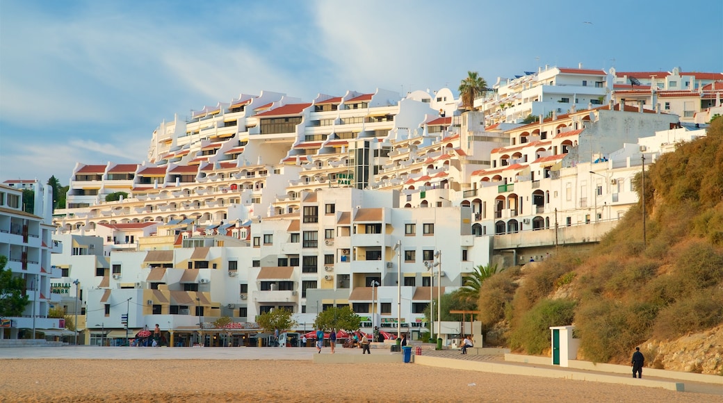 Fisherman\'s Beach showing a beach and a coastal town