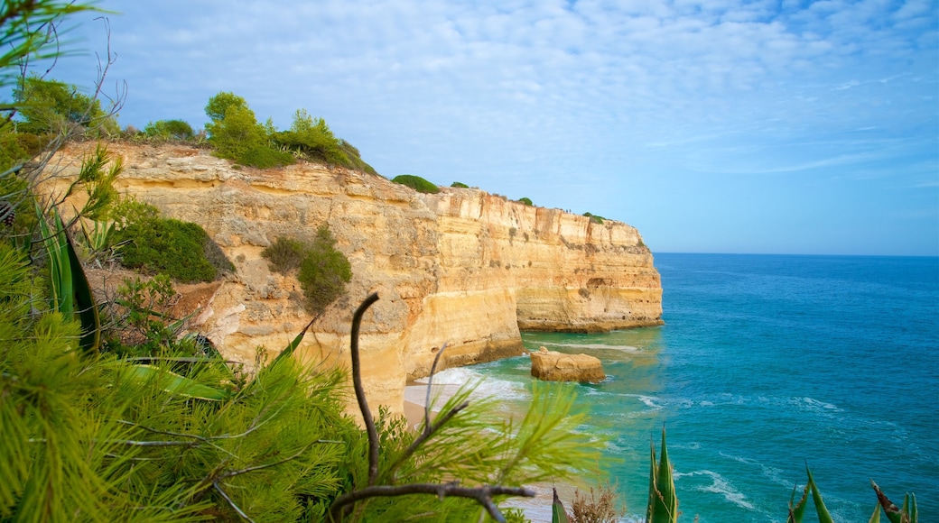 Marinha Beach showing rocky coastline and general coastal views