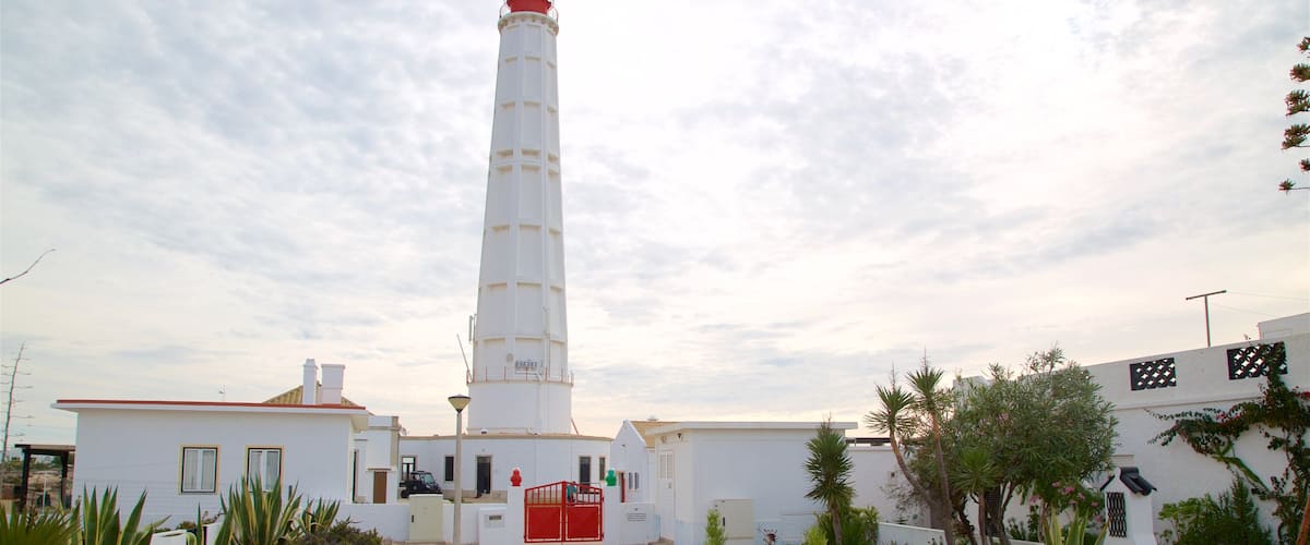 Faro qui includes phare et coucher de soleil
