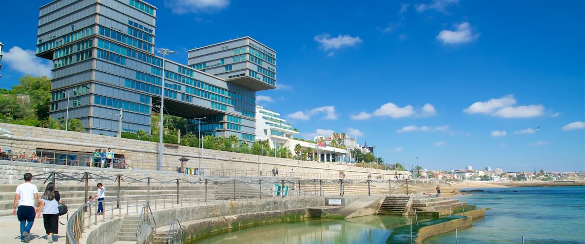 Cascais which includes modern architecture and a river or creek