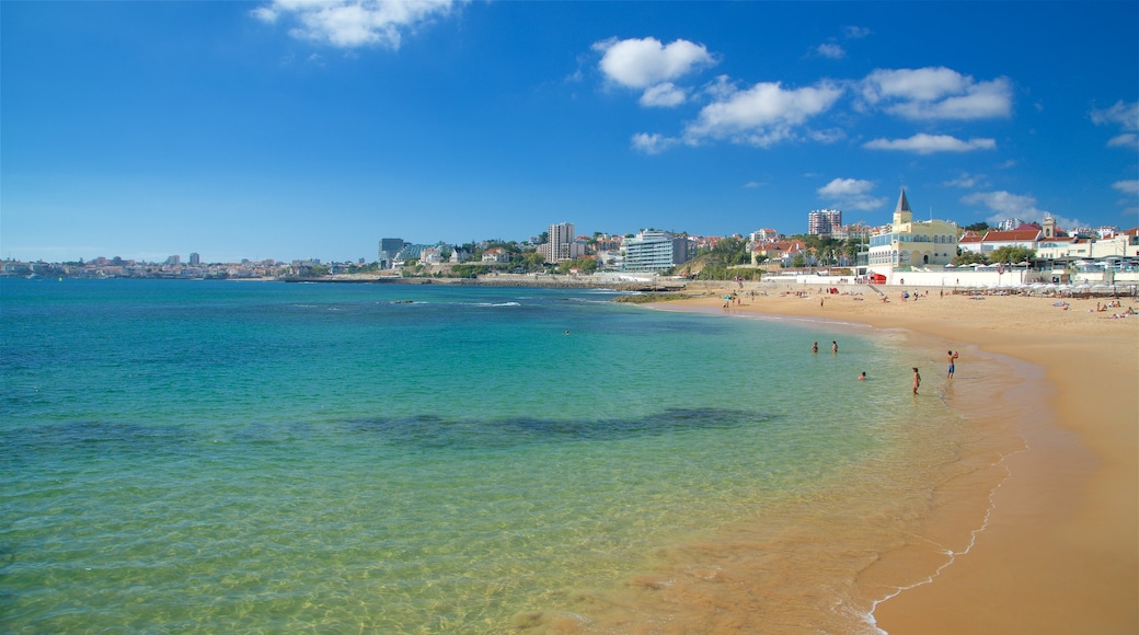 Tamariz Beach showing general coastal views, a beach and swimming