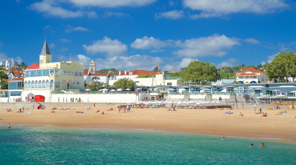 Tamariz Beach which includes a beach, swimming and general coastal views