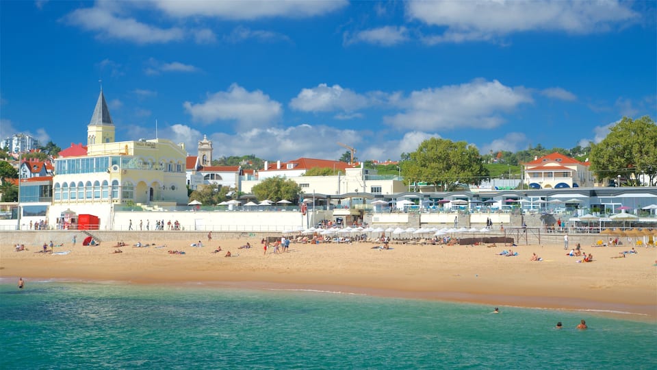Tamariz Beach showing a beach, swimming and general coastal views