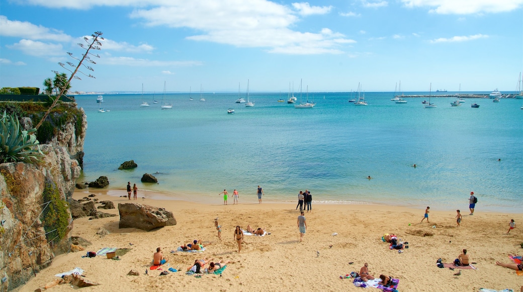 Rainha Beach which includes general coastal views, rocky coastline and a beach