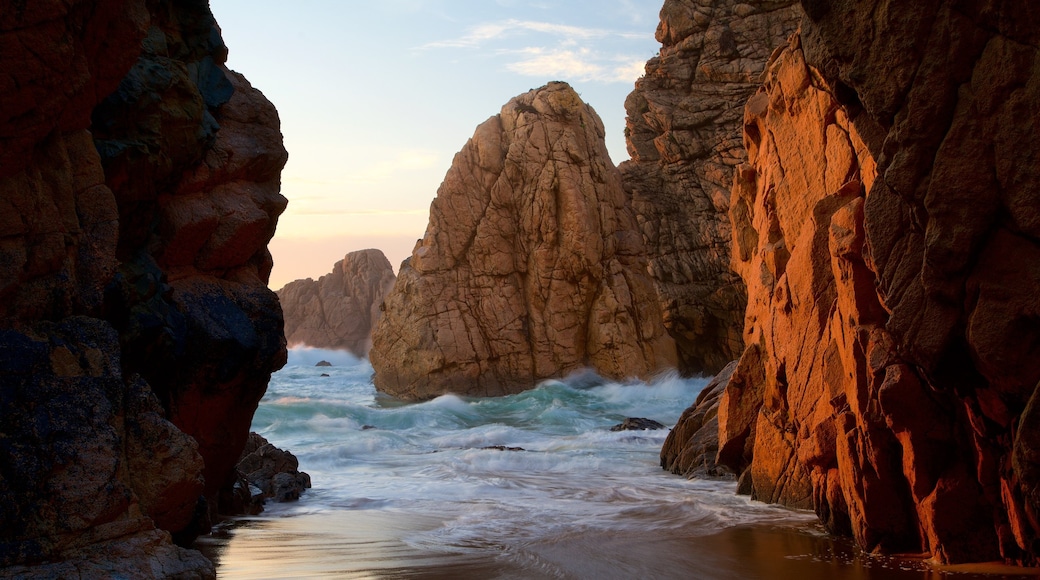 Ursa Beach showing a sunset, rugged coastline and general coastal views