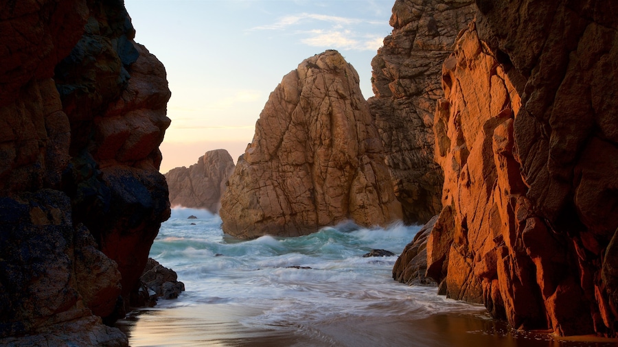 Ursa Beach showing a sunset, general coastal views and rugged coastline