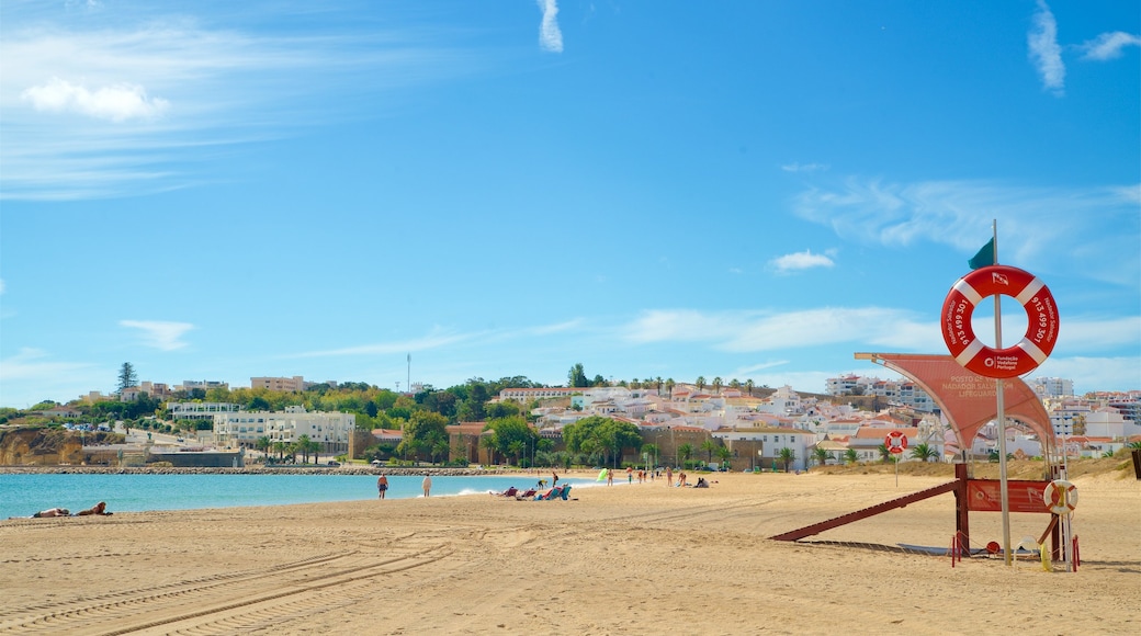 Meia Praia Beach which includes general coastal views, a beach and a coastal town
